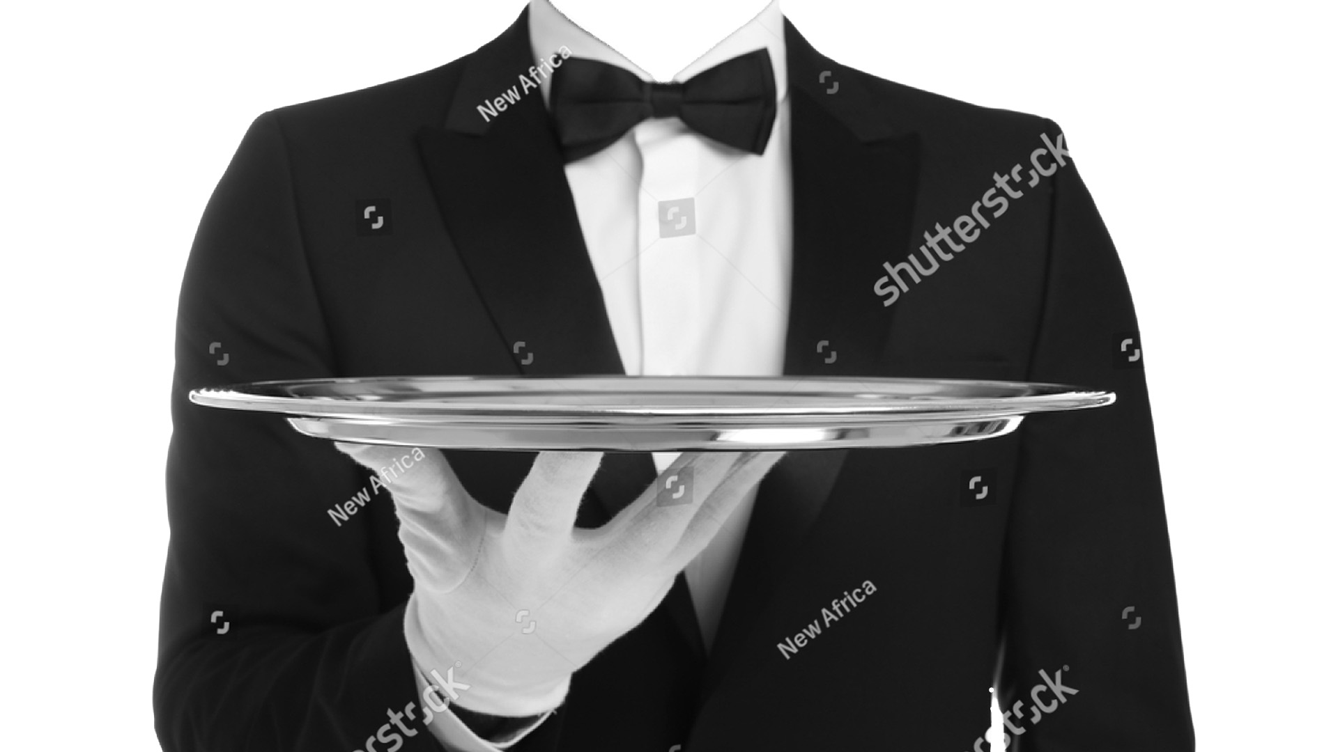 Butler facing forward dressed in formal attire holding an empty trey